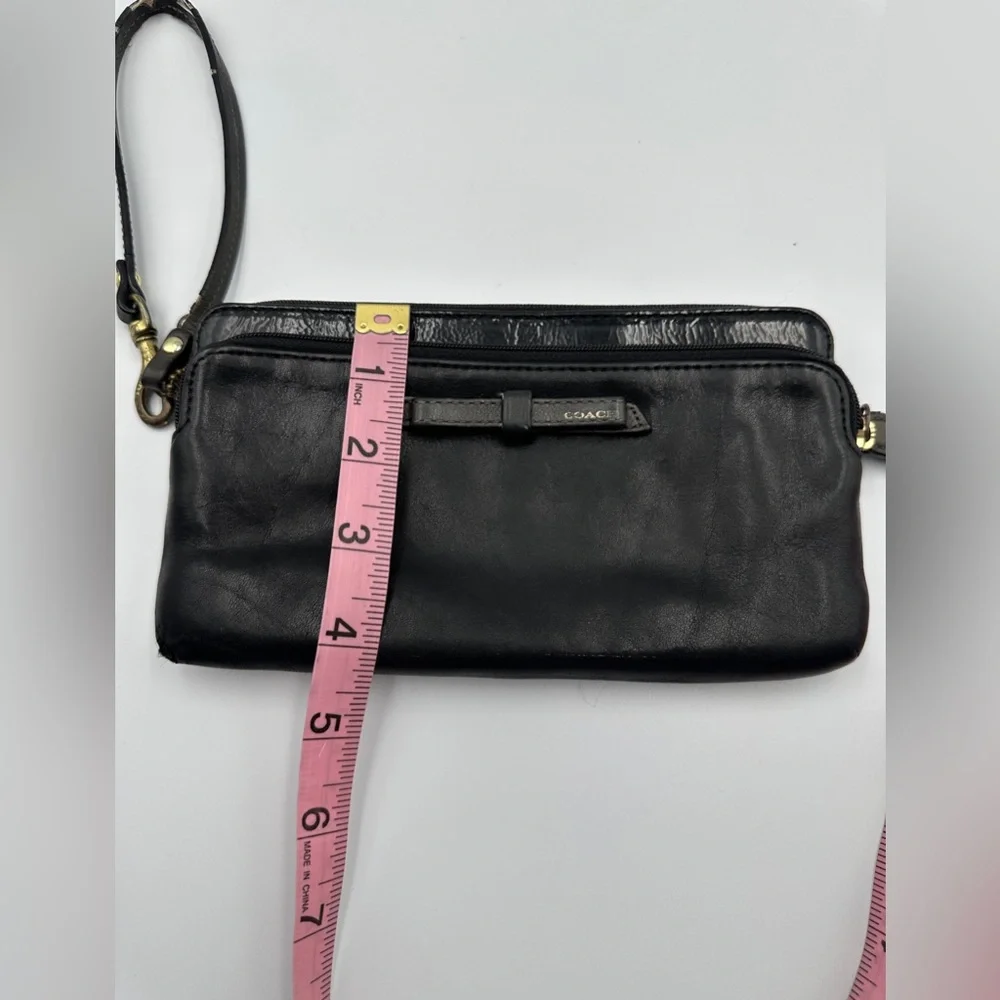 Coach Black Leather Wristlet Wallet With Patent Leather Accent And Bow Detail